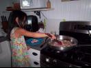 Ella making breakfast for everyone.