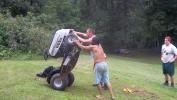 Ryan can lift up the lawn mower also.