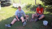 Brad and Ryan enjoying Rascal's company.