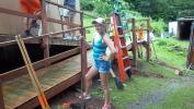 Chloe digging a post hole.