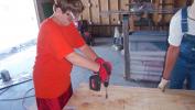 Making a hole for an electric connection.