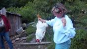 Ingrid with a rooster
