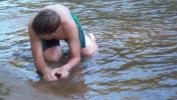 Connor digging for a rock.