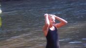 Washing hair in the river