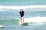 Ella surfing 