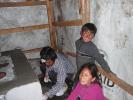 Migual using my light to put on the stucco