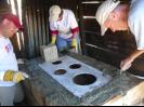 Theresa, Wayne and Dave working on our 4th and last stove