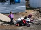 Girls washing hair and laundry
