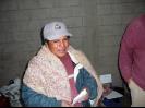 Don Policario (the mason) receiving a prayer shawl