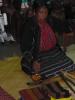 Woman spinning in the market place in Antigua