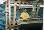The weaver with the big loom in the village