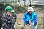 Gail and Theresa doing mortar work