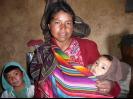 A family waiting for a stove