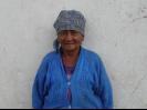 Grandmother waiting for the stove to be finished