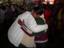 Gynanne giving a Prayer Shawl to a stove recipient