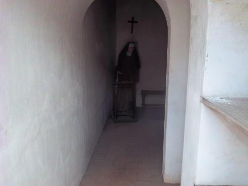 A cell in the convent fixed like it might have been.