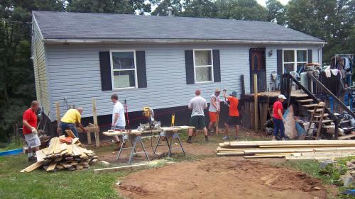 Taking measurements for the wheelchair ramp.