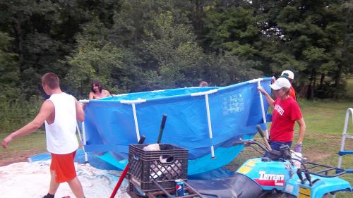 Moving Becky's swimming pool.