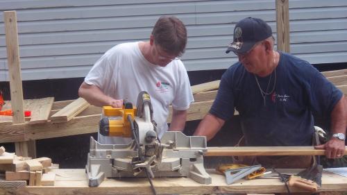 Mark and Dick measuring twice and cutting once.