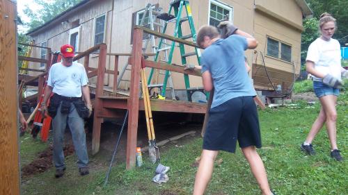 Connor working hard on one of the holes.