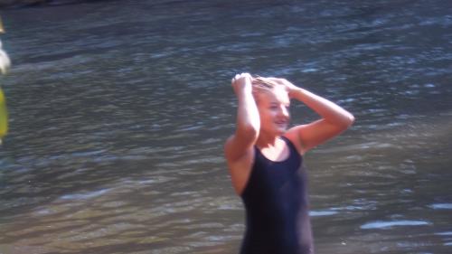 Washing hair in the river