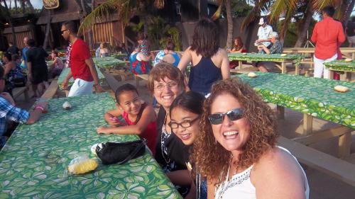 Sondi, Grace, Maria, and Ella at the Luau