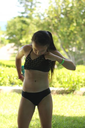 putting on sunscreen