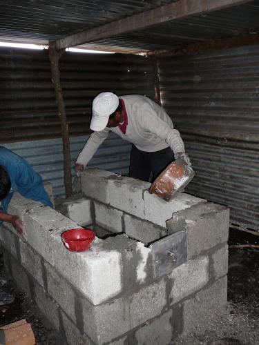 Don Juan working on the first stove