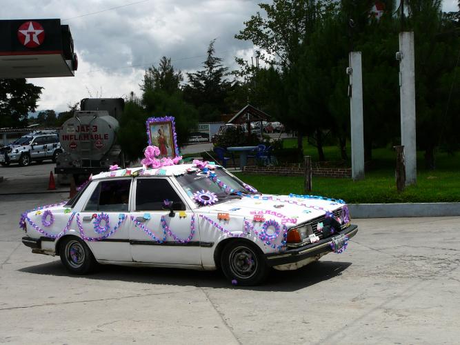 Decorated car celebrating a saint's day