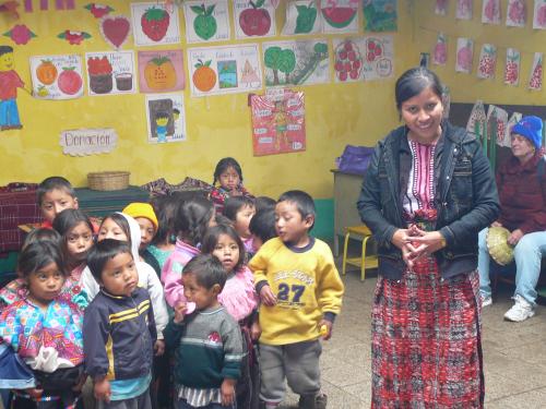 Kindergarten teacher and her class