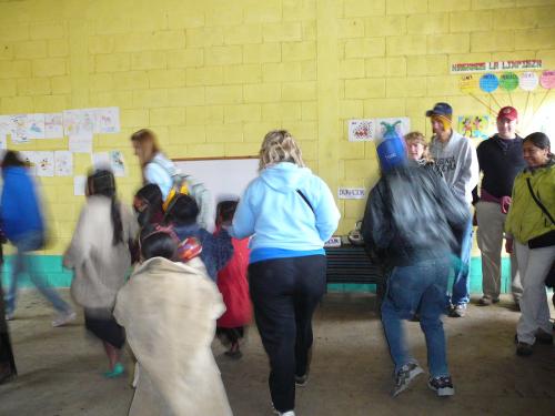 Children pulling us into the dance
