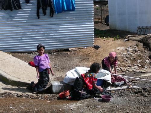 Girls washing hair and laundry
