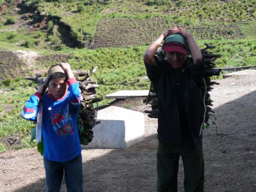 Carrying firewood to create a feast for us