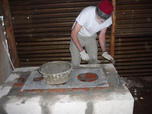 Bill working hard on a stove