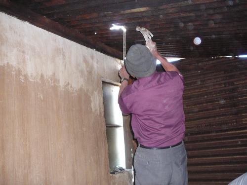Don Juan cutting a chimney hole