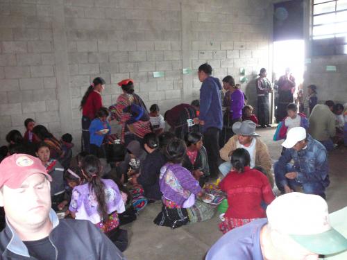 Gathering for the final meal in the village