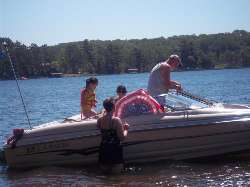 Decorating the boat for the 4th of July.