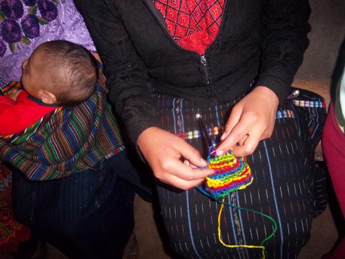 Knitting and watching the baby!