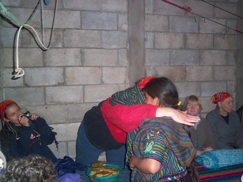 Angie receiving her weaving.