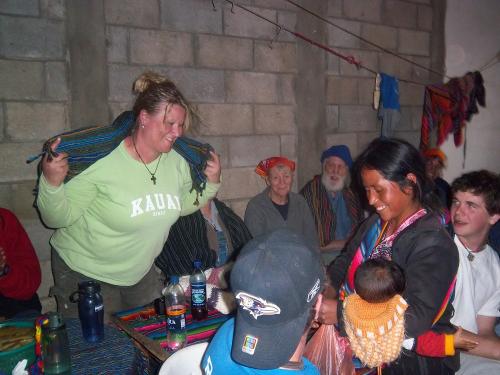 Kimberly receiving her weaving.